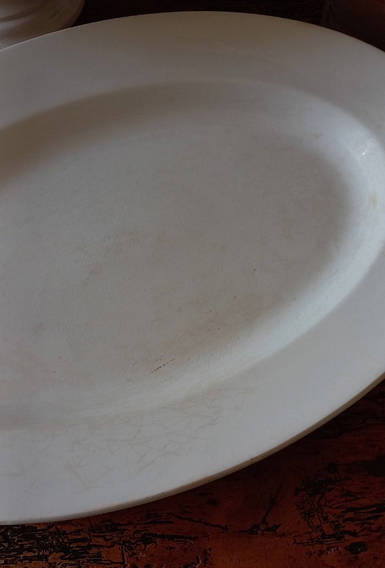 Image 1 of Plato ovalado muy grande de porcelana opaca de Luneville 1880-1900.