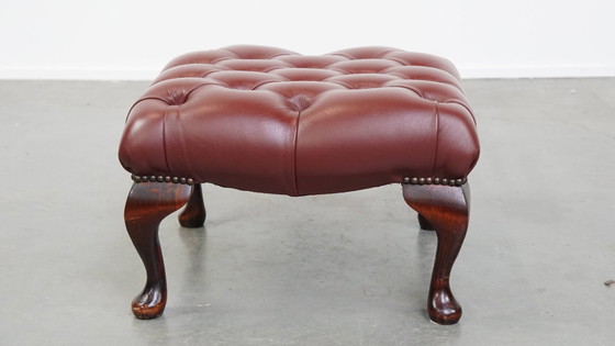 Image 1 of Elegant red/brown Chesterfield stool in very good condition