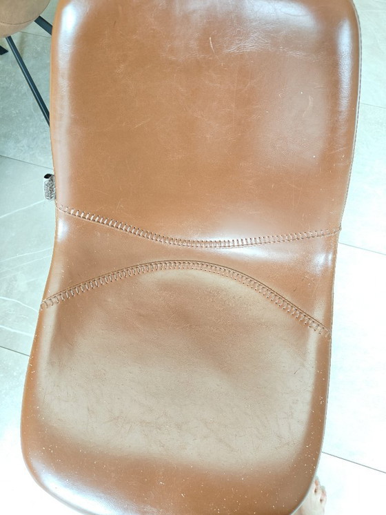 Image 1 of 7 Dutchbone cognac chairs