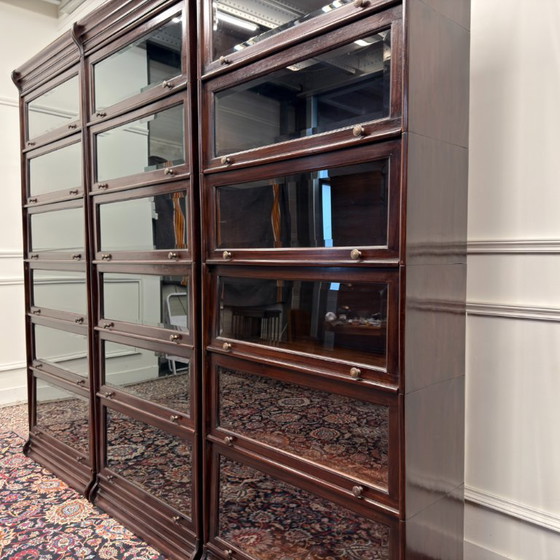 Set of Classic English Globe Wernicke Bookcases – Glass, Wood (photo 9 of 15)