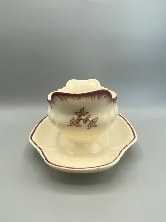 Salsiera Longwy in maiolica pregiata, decorazione marsigliese, tulipani marroni e verdi, corpo a coste, (photo 2 of 6)