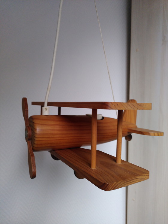 Image 1 of Suspension Avion en bois vintage 