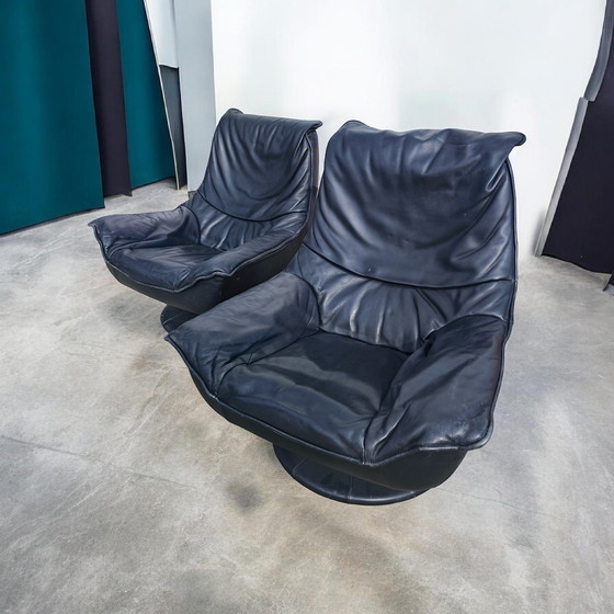 Image 1 of Pair of black 1970s leather swivel chairs