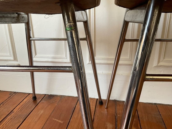 Image 1 of Een paar vintage stoelen uit de jaren 50 - gestempeld - verchroomd staal en gepatineerd kunstleer.
