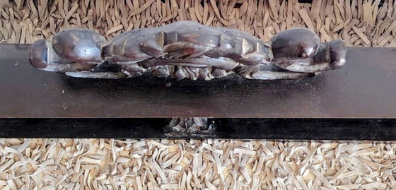 Image 1 of Panneau ancien en bois sculpté représentant un chérubin.