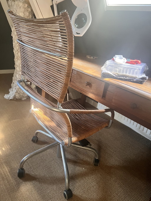 Italian special office chair made of leather in brown.