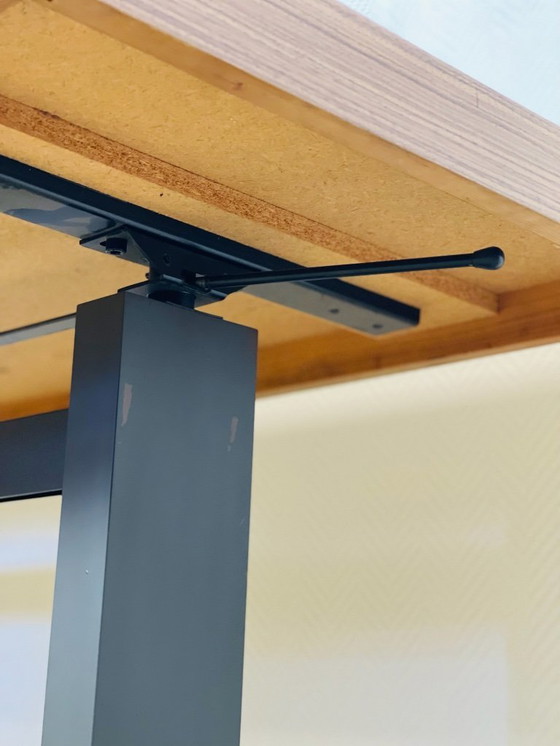 Image 1 of Vintage lift-top coffee table in Formica and black metal, 1970