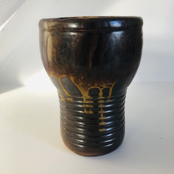 Image 1 of Vaso a torso in ceramica smaltata metallizzata