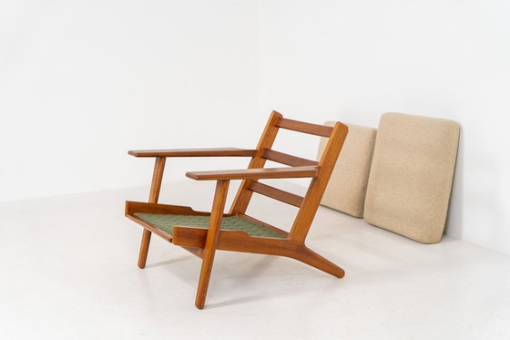 Image 1 of Vroege GE-290 loungestoel in eikenhout van Hans J. Wegner voor Getama (Denemarken, 1953).