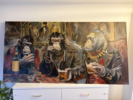 Tres monos en el bar