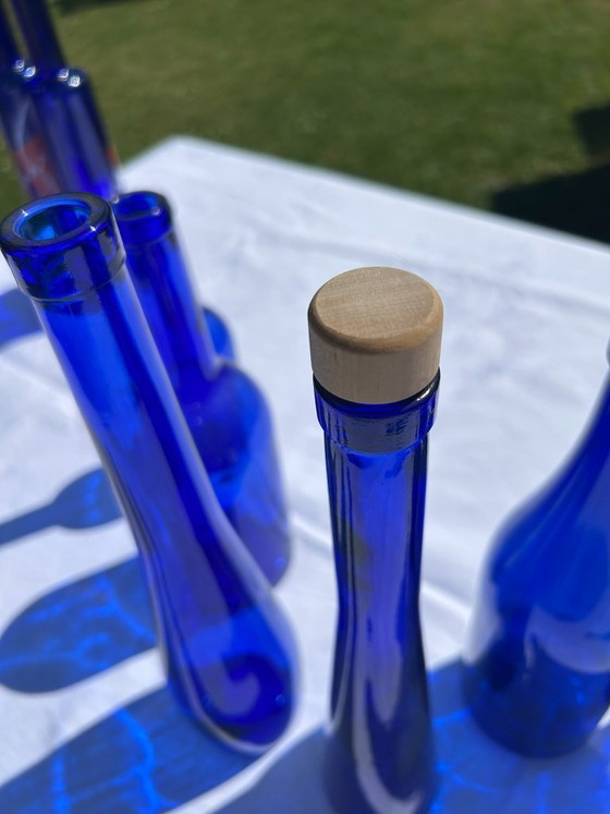 Image 1 of Set van 6 kobaltblauwe glazen flessen/vazen/vintage blauwe decoraties
