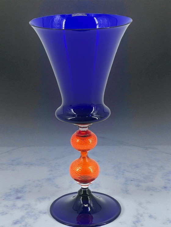 Image 1 of Signed Murano art glass goblet by Maestro Carlo Tosi “Caramea” – Blue bowl, orange stem, 24K gold leaf – 1970s