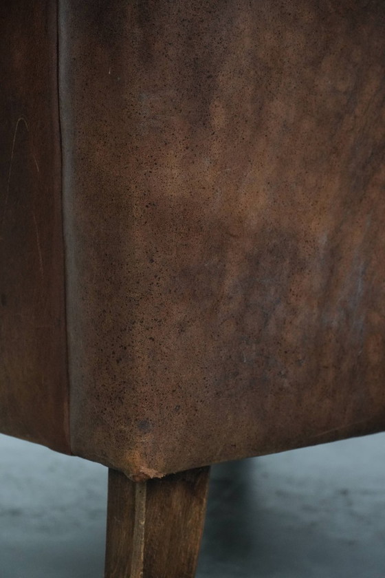 Image 1 of Fauteuil vintage en peau de mouton avec du caractère