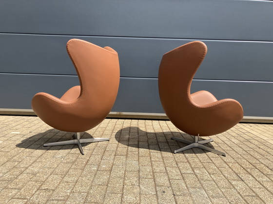 Image 1 of 2x Fritz Hansen Egg Chair + Ottoman en cuir Cognac NEUF !!!