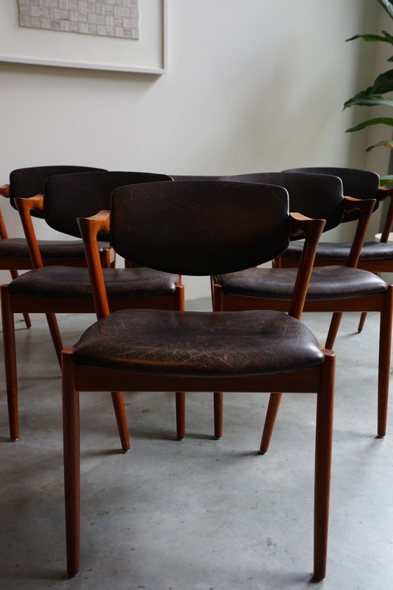 Image 1 of 6 Kai Kristiansen stoelen | Model 42 | Teak Leder patina