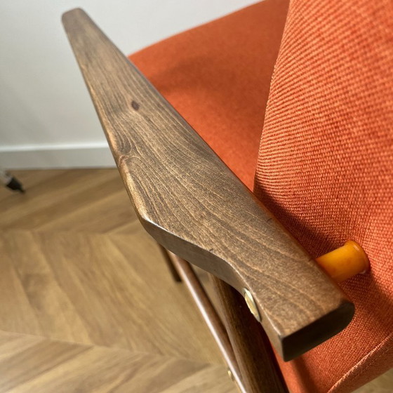 Image 1 of Vintage oranje Poolse fauteuil: loungestoel uit het midden van de 20e eeuw, gerestaureerd.