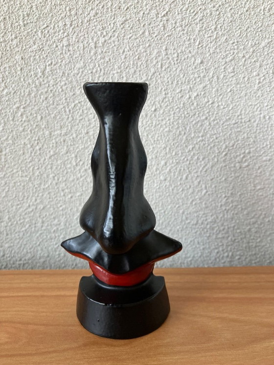 Image 1 of Salvador Dali glasses stand. Familiar design nose with mustache and lips.