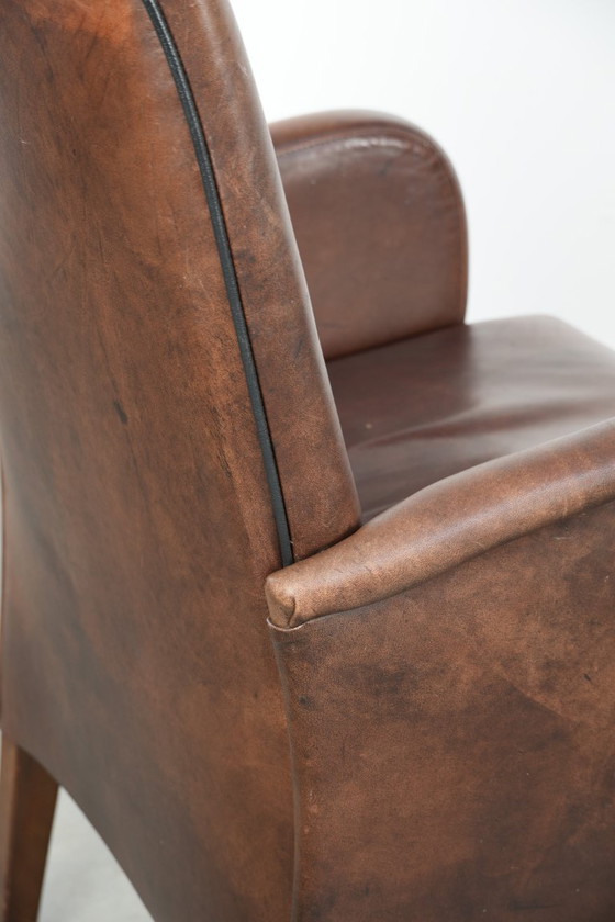 Image 1 of 2 x Mooi afgewerkte eetkamerstoel/ bijzetstoel met armleuningen gemaakt van rundleer