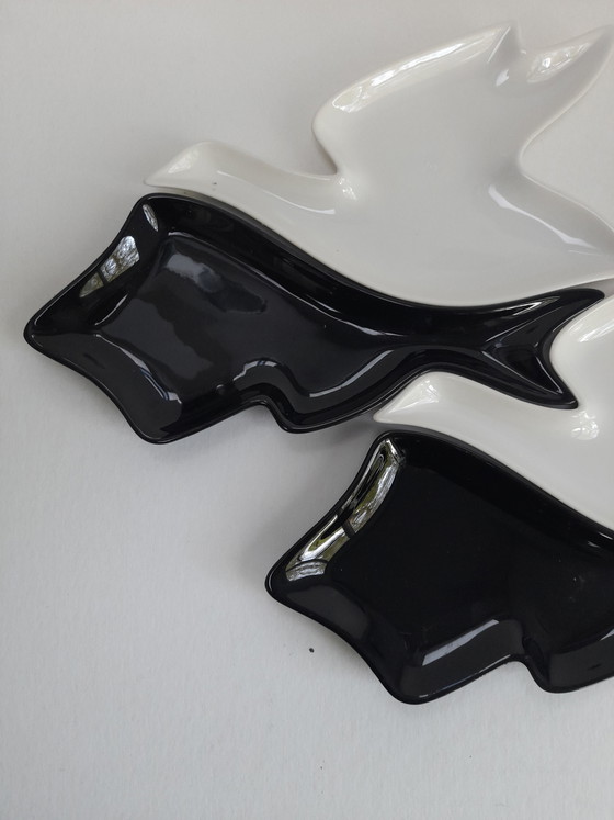 Image 1 of Bird and fish dishes according to Escher