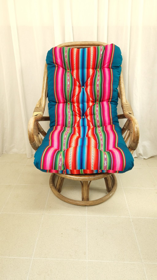 Vintage rattan swivel chair with new colorful cushion