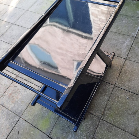 Image 1 of Zwarte Design Serveerwagen – Hoogglans – Z‑Frame – Twee Lagen