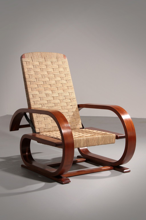 An Exceptionally Rare Mahogany Recliner Crafted in Italy During the 1950s