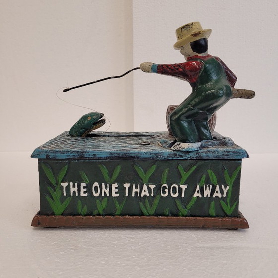 Image 1 of "Fisherman" piggy bank with fishing mechanism, cast iron, 1950s - USA.
