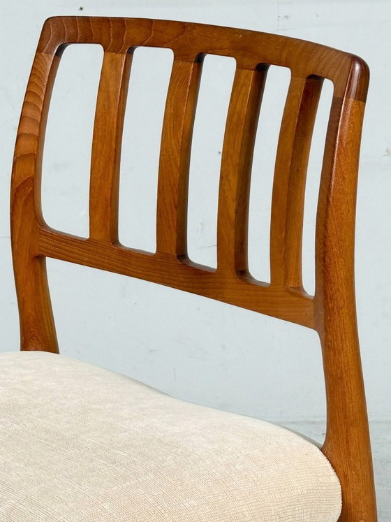 Image 1 of JL Møllers, ensemble de 4 chaises de salle à manger, modèle '83', teck, laine, années 1960, Danemark (4)