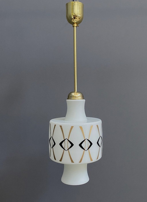 Lampe suspendue en verre opalin avec dessin or et noir