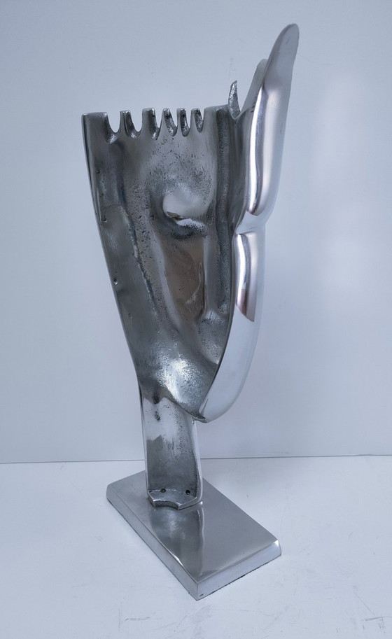 Image 1 of sculpture visage stylisé métal poli