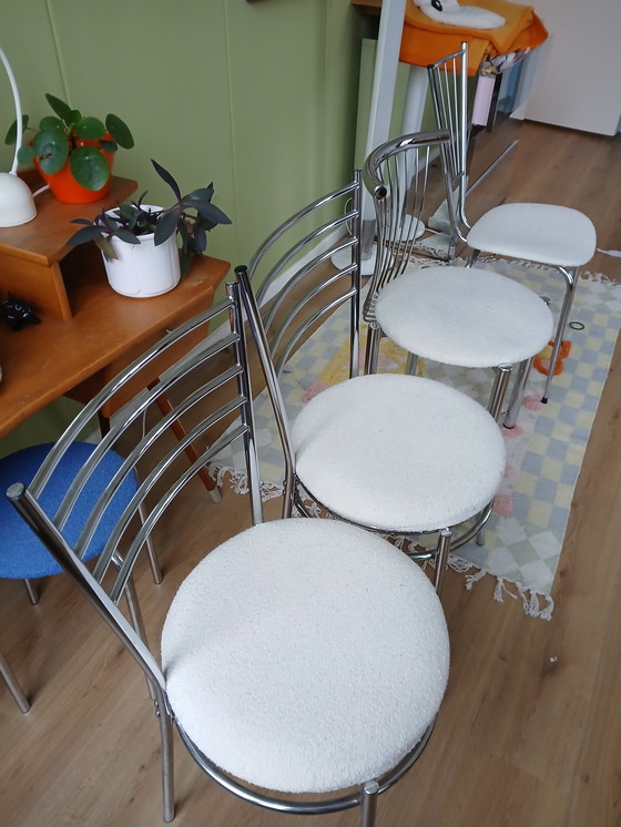 Image 1 of Vier rvs stoelen met boucle stof