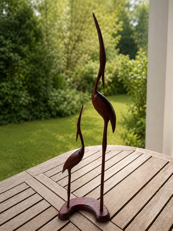 Image 1 of Deens design uit het midden van de 20e eeuw – Teakhouten kraanvogels, sculpturen van 72 en 46 cm