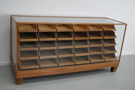 Antique British haberdashery cabinet/shop counter in maple and oak, 1920/30s