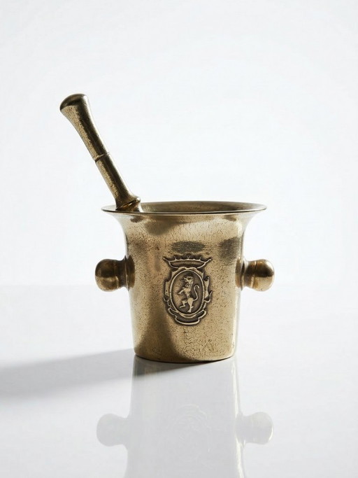 Gilt bronze apothecary's mortar and pestle with heraldic decoration, 20th century