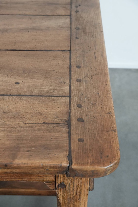 Image 1 of Robust antique French 6-person dining table made of fruit wood with 3 drawers from the late 18th century