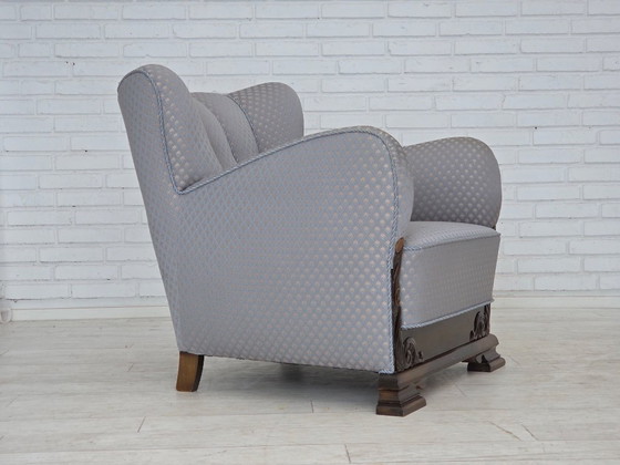 Image 1 of Deense fauteuil uit de jaren 50, meubelstof, gesneden eikenhout.