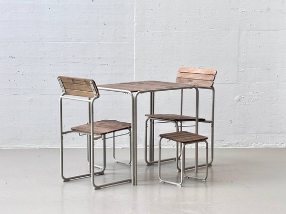 Image 1 of IKEA FURUÖN tuinset met tafel, 2 stoelen en 2 krukjes, gemaakt van acaciahout.