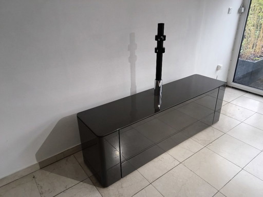 Mobile basso porta TV Hülsta Gentis color antracite lucido con colonna porta TV