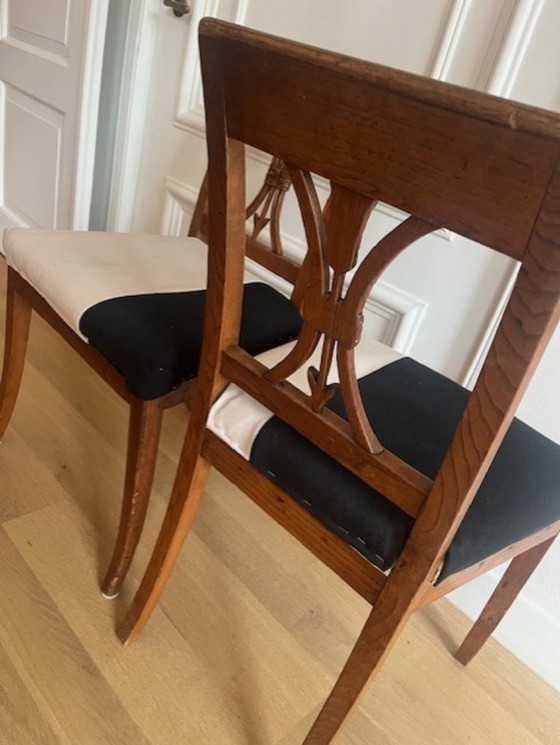 Image 1 of 2 antique ear of corn dining chairs