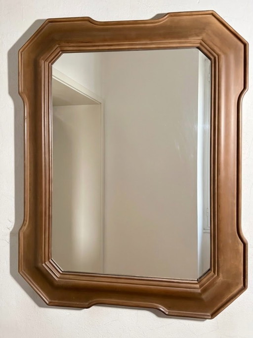 Wall mirror with shaped frame, often called 'cabaret' or 'tray' style