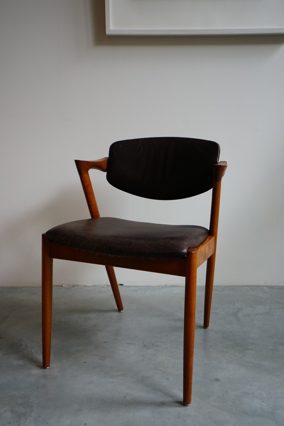 Image 1 of 6 Kai Kristiansen stoelen | Model 42 | Teak Leder patina
