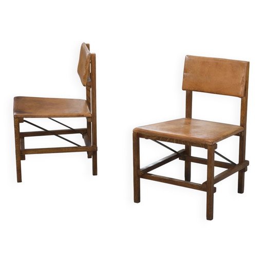 Pair of oak and leather chairs in the style of Gerrit Rietveld 1960s.