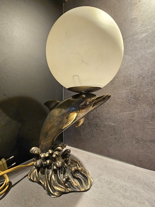 Art Deco dolphin lamp with glass shade