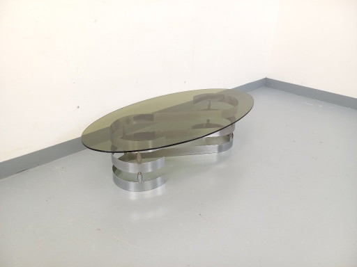 Vintage ovale salontafel van rookglas en verchroomd metaal uit de jaren 70.