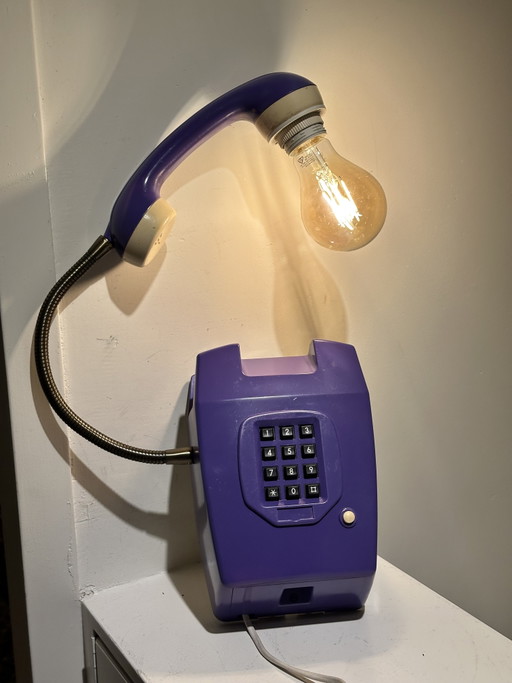 Vintage purple hang-up telephone