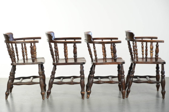 Image 1 of 4 x Antique wooden English pub/captain chairs from the late 19th century with character