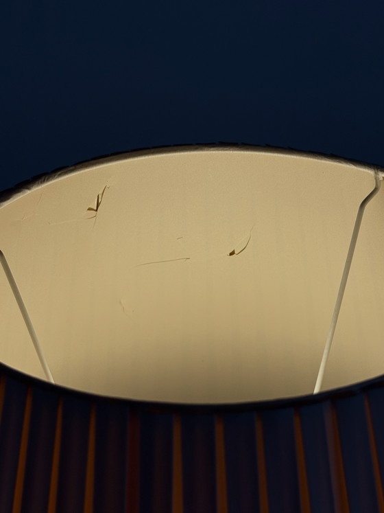 Image 1 of Vintage wrought iron table lamp in a swirl shape with a pleated shade