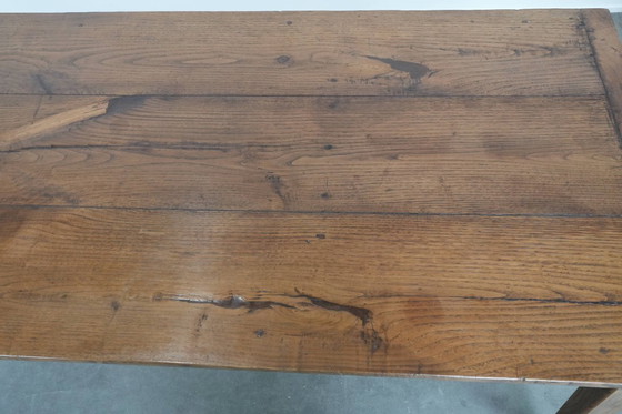 Image 1 of Antique French oak farmhouse dining table for 6 to 8 people with three drawers