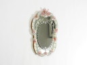 Lovely Italian mid-century wall mirror with a Murano glass frame and blossoms