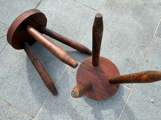 Image 1 of 2 brutalist tripods.